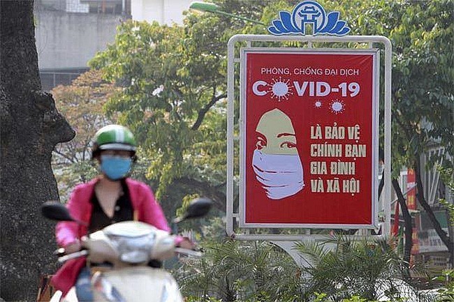 Vietnam menjadi negara pelopor tentang kemampuan menghadapi wabah Covid-19 di dunia - ảnh 1