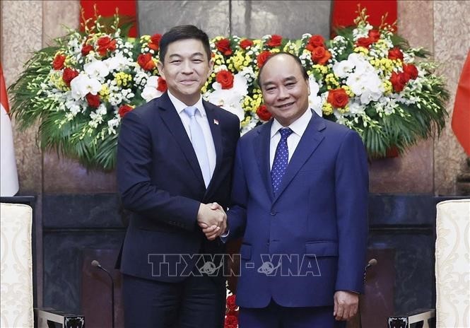 Presiden Nguyen Xuan Phuc Terima Ketua Parlemen Singapura, Tan Chuan Jin - ảnh 1