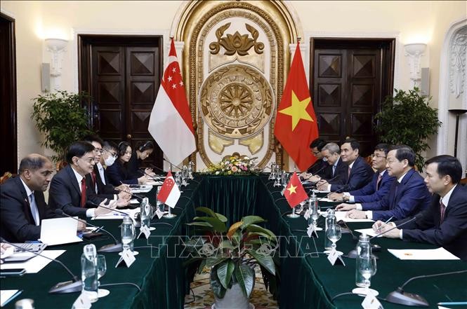 Membawa Hubungan Kemitraan Strategis Vietnam - Singapura Berkembang secara Substantif dan Kian Mendalam - ảnh 1