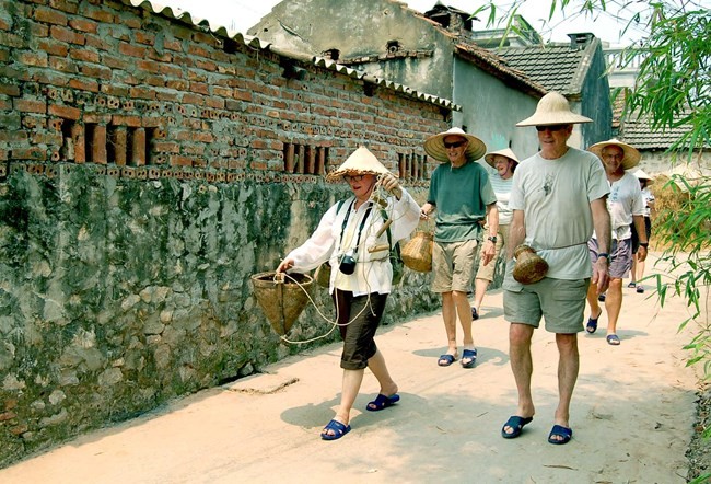 កសិករនៅខេត្ត Ha Giang ធ្វើទេសចរណ៍សហគមន៍ - ảnh 1