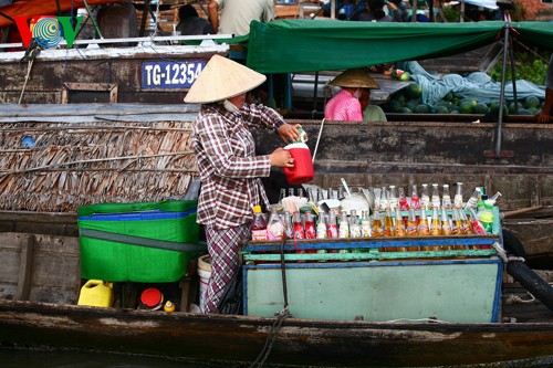 ផ្សារបណ្ដែកទឹក Cai Be - កន្លែងទេសចរណ៍ដ៏វិសេសវិសាលនៃតំបន់ណាមបូខាងលិច - ảnh 10