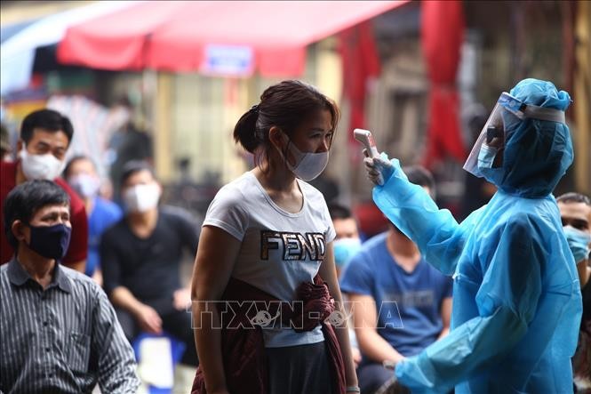 Vietnam terus tidak mencatat kasus infeksi Covid-19 baru di masyarakat - ảnh 1