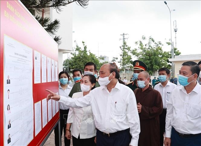 Presiden Nguyen Xuan Phuc Melakukan Kontak dengan Pemilih Kota Ho Chi Minh - ảnh 1