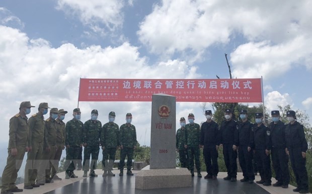 Pasukan Penjaga Perbatasan Vietnam-Tiongkok-Laos Bertemu di Simpang Tiga Perbatasan - ảnh 1