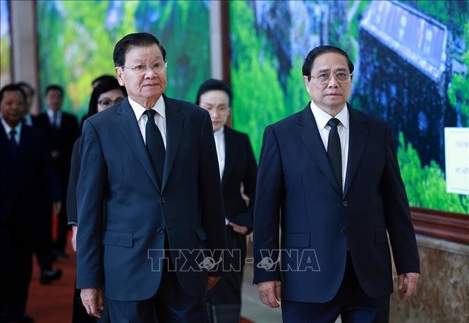 PM Vietnam, Pham Minh Chinh Lakukan Pertemuan dengan Sekjen, Presiden Laos - ảnh 1