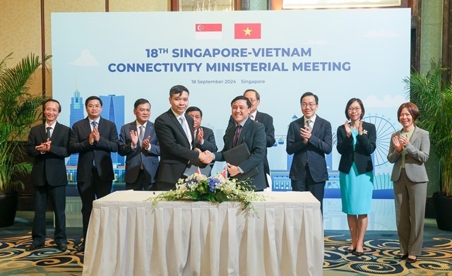 Konferensi Menteri ke-18 Vietnam-Singapura Perluas Kerja Sama di Bidang Energi Bersih - ảnh 1