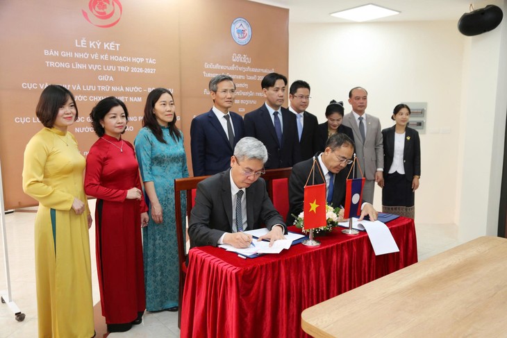 Direktorat Arsip Dua Negara Vietnam dan Laos Memperkuat Pelestarian dan Pengembangan Nilai-Nilai Abadi Dua Bangsa - ảnh 1