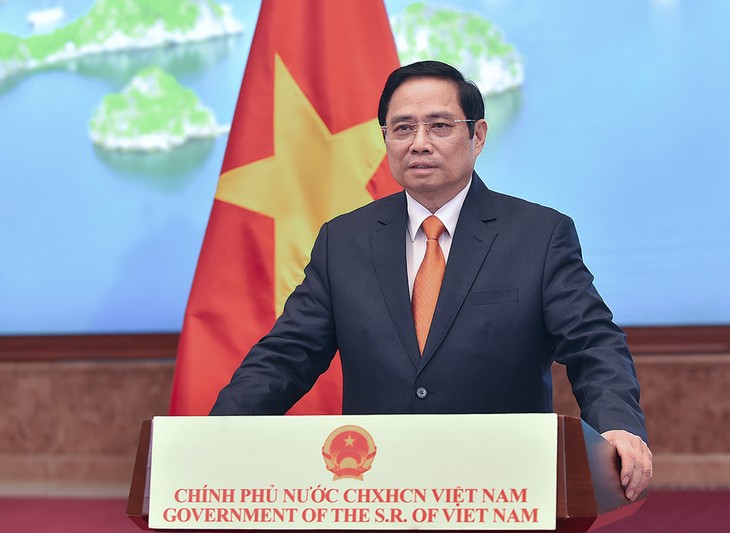 PM Pham Minh Chinh: Vietnam Bersedia Bekerja Sama Dengan Tiongkok dan Negara-negara Lain untuk Dorong Perdagangan Jasa pada Umumnya dan Ekonomi Digital pada Khususnya. - ảnh 1