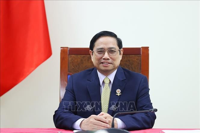 Perdana Menteri Pham Minh Chinh Berterima Kasih Kepada Pejabat Tinggi, Tokoh Agama, dan Masyarakat Beragama dalam Pekerjaan Pencegahan dan Penanggulangan Pandemi. - ảnh 1