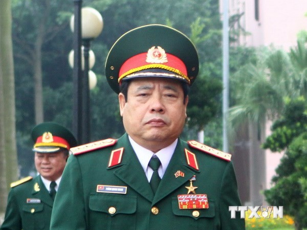 Defense Minister Phung Quang Thanh visits China - ảnh 1