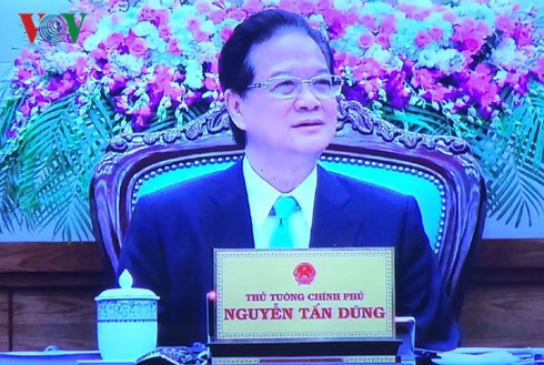 Prime Minister Nguyen Tan Dung receives Lao Deputy Prime Minister Somsavat Lengsavad - ảnh 1