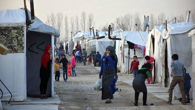 First aid convoy in 2018 enters Syria's Ghouta - ảnh 1