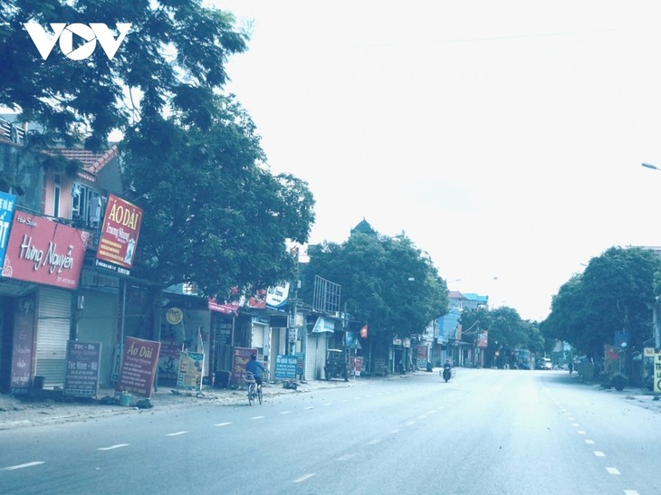 Garbage collection in Bac Ninh's COVID-19 isolation areas - ảnh 9