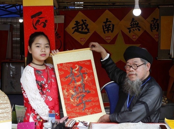 Vietnamese traditional calligraphy during Tet - ảnh 2