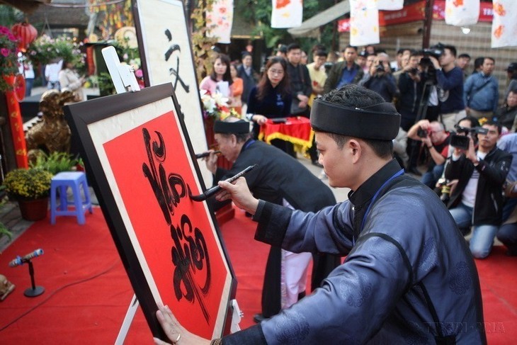 Vietnamese traditional calligraphy during Tet - ảnh 4