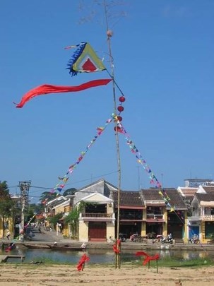 Cây nêu – la perche rituelle du Têt - ảnh 4