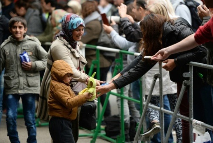 Crise des migrants: arrivée au Royaume-Uni des premiers réfugiés syriens - ảnh 1