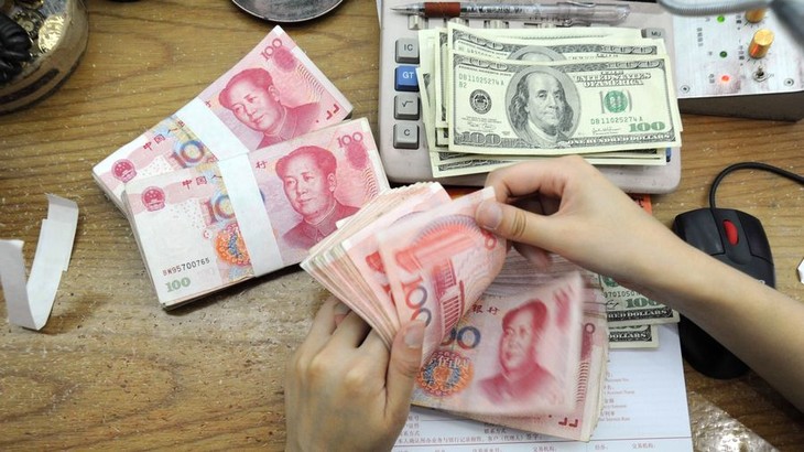 Hausse du yuan par rapport au dollar américain - ảnh 1