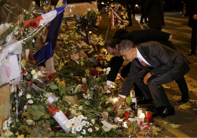 Barack Obama se recueille au Bataclan - ảnh 1