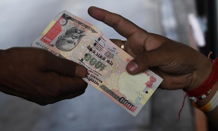 En Inde, 24 milliards de billets démonétisés  - ảnh 1