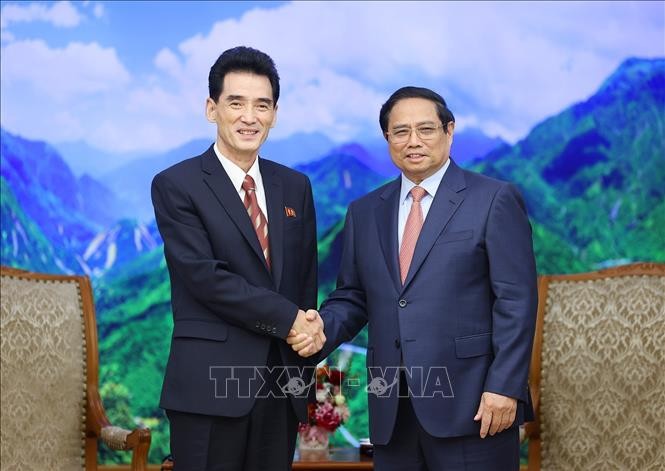 Pham Minh Chinh rencontre Ri Sung-guk - ảnh 1