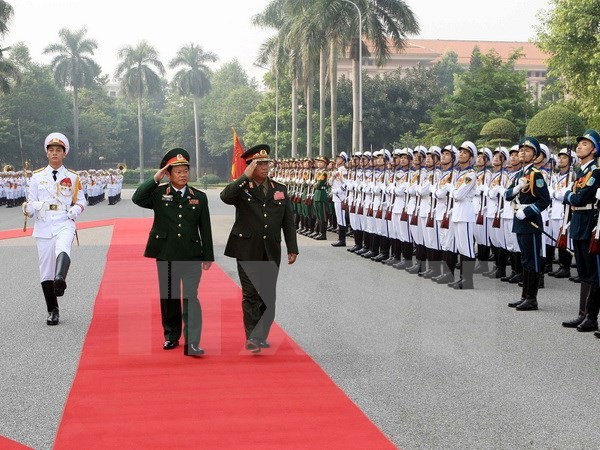 Memperkuat kerjasama antara tentara Vietnam dan Laos - ảnh 1