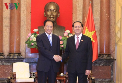 Presiden Tran Dai Quang menerima  Kepala Kantor Berita Xinhua yang sedang melakukan kunjungan kerja di Vietnam - ảnh 1