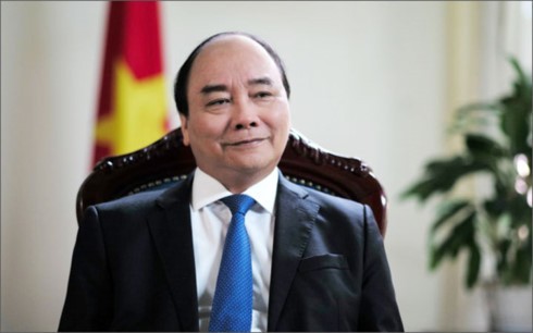 PM Nguyen Xuan Phuc tiba di Amsterdam memulai kunjungan di Belanda - ảnh 1