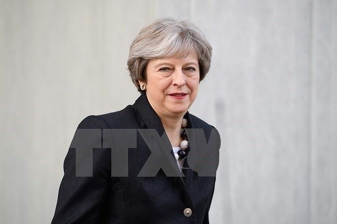 Pers Inggris: PM Theresa May siap mereshuffle kabinet - ảnh 1