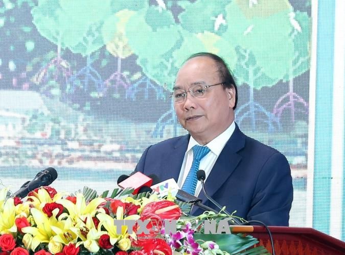 PM Nguyen Xuan Phuc melakukan temu kerja dengan pimpinan daerah-daerah di Viet Nam Selatan - ảnh 1