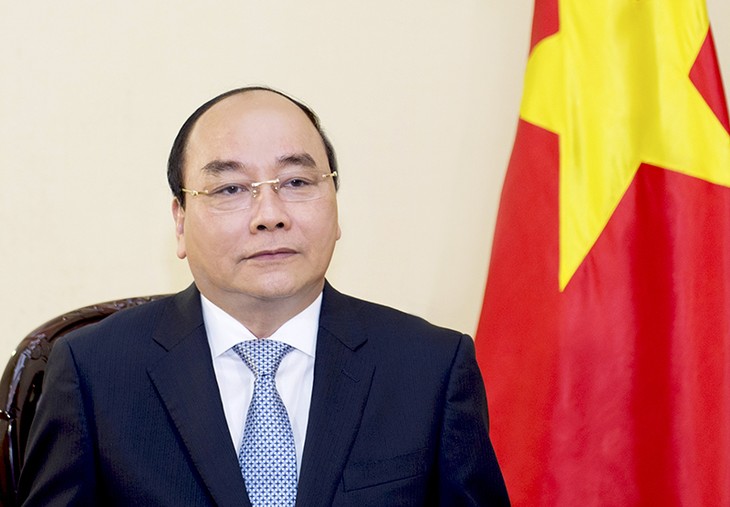 PM Nguyen Xuan Phuc mengirimkan pesan kepada Konferensi  online WHO - ảnh 1