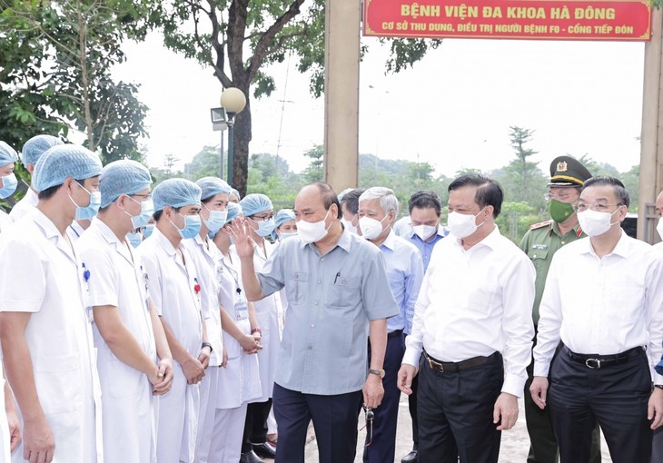 Presiden Nguyen Xuan Phuc: Dengan Dukungan Rakyat, Kita Pasti Menyukseskan Penanggulangan Wabah Covid-19 - ảnh 1