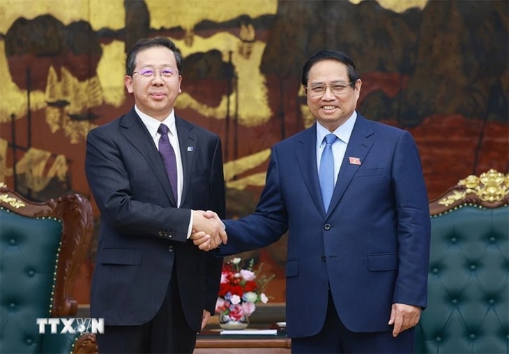 PM Vietnam, Pham Minh Chinh Meminta Grup Huadian supaya Melakukan Investasi, Turut Menjamin Keamanan Energi bagi Vietnam - ảnh 1