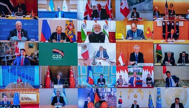 G 20 ໃຫ້​ຄຳ​ໝັ້ນ​ສັນ​ຍາ​ຈະ​ເຮັດ​ທຸກ​ສິ່ງ​ທຸກ​ຢ່າງ​ເພື່ອຫຼຸດຜ່ອນຄວາມ​ສ່ຽງ​ ​ເສດ​ຖະ​ກິດ​ທົ່ວ​ໂລກຖືກຊຸດ​ໂຊມໃນ​ລະ​ດັບ​ຕຳ​ສຸດ - ảnh 1