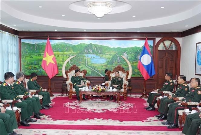 ລາວ​ສືບ​ຕໍ່​ຍູ້​ແຮງ​ວຽກ​ງານ​ໂຄ​ສະ​ນາ ລະ​ຫວ່າງ​ສອງກອງ​ທັບ ຫວຽດ​ນາມ - ລາວ - ảnh 1