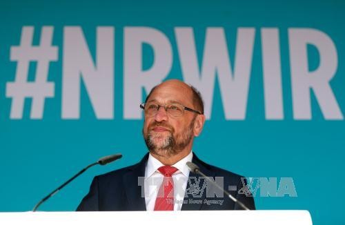  Angela Merkel gana un 13% de votos a favor más que su adversario Martin Schulz - ảnh 1