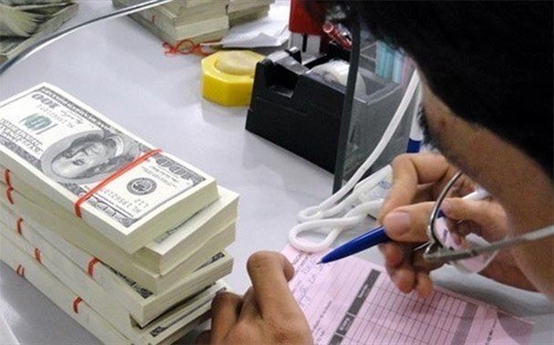 中銀、為替レートを上方調整 - ảnh 1