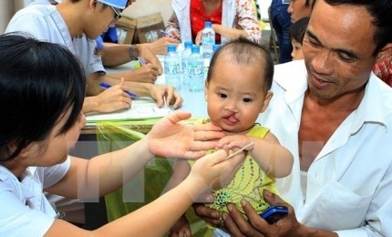 越米、人道的整形手術で協力 - ảnh 1