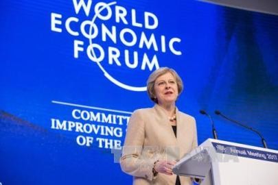 ＥＵ離脱後の英国、自由貿易擁護者の役割果たす＝メイ首相 - ảnh 1