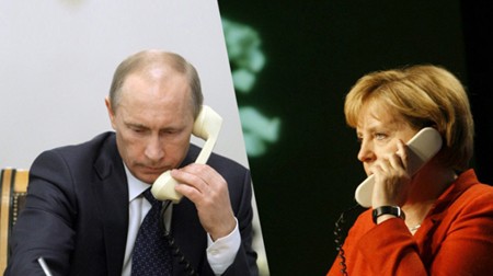 Pimpinan Jerman dan Rusia mengadakan pembicaraan per telepon tentang situasi Ukraina. - ảnh 1