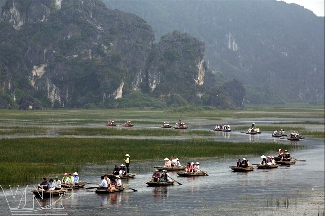 Menikmati  keindahan   yang masih primitif dan  pemandangan alam Van Long - ảnh 1