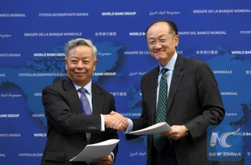 WB dan AIIB menandatangani permufakatan tentang program pinjaman modal  bersama yang pertama - ảnh 1