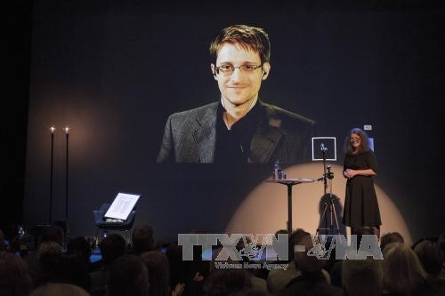 Mengumumkan dokumen rahasia E.Snowden kepada kalangan pers - ảnh 1