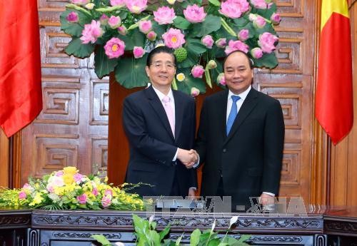 PM Vietnam, Nguyen Xuan Phuc menerima Menteri Keamanan Publik Tiongkok, Guo Shengkun - ảnh 1