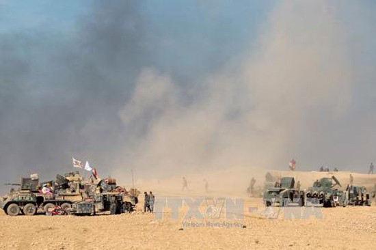 Tentara Pemerintah Irak berbaku hantam sengit dengan IS di kota Mosul - ảnh 1