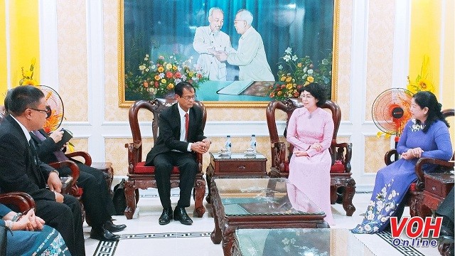 Berbagi pengalaman tentang aktivitas Front antara Kota Ho Chi Minh  dan Provinsi Champasak (Laos) - ảnh 1