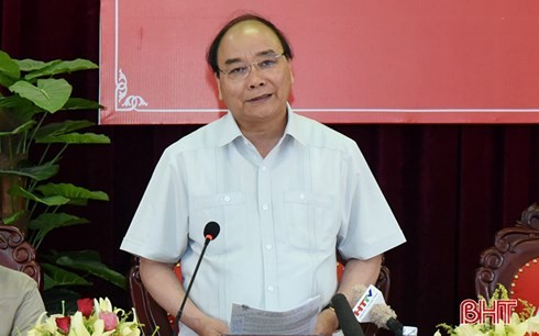 PM Viet Nam, Nguyen Xuan Phuc memeriksa pola percontohan pedesaan  baru  di provinsi Ha Tinh - ảnh 1