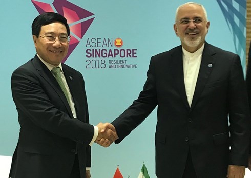 Deputi PM, Menlu Viet Nam, Pham Binh Minh  mengadakan pertemuan bilateral dengan Menlu Jepang dan  Menlu Iran - ảnh 2