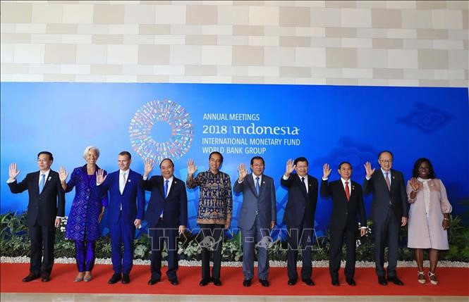 PM Viet Nam, Nguyen Xuan Phuc menghadiri acara pembukaan Konferensi Tahunan IMF-WB 2018 - ảnh 1