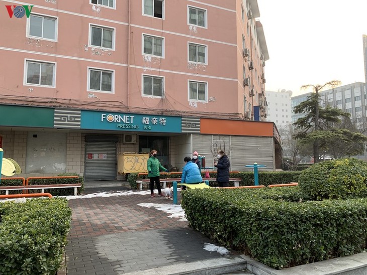 Ảnh: Đường phố Bắc Kinh vắng lặng vì dịch Covid-19 - ảnh 19